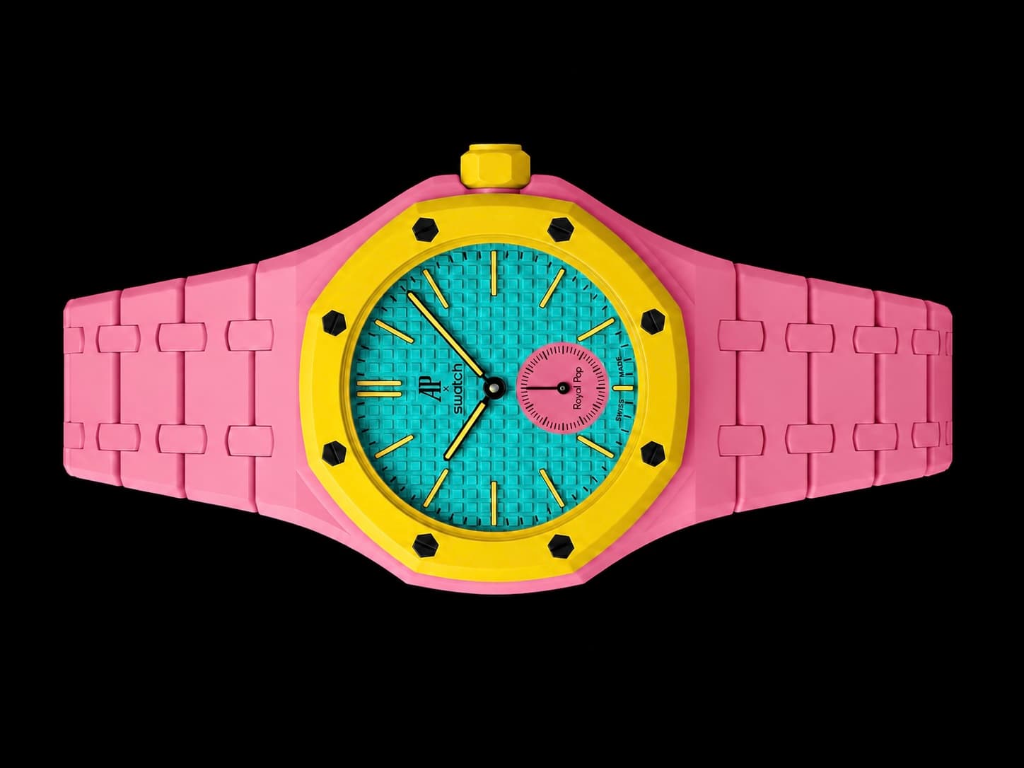 Vibrant pink and yellow watch featuring a turquoise waffle dial and a pink sub-dial.